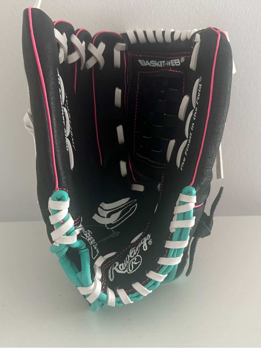 Rawlings Black Youth Baseball Glove with Teal and Pink Accents Left Hand